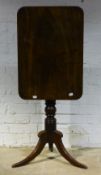 A 19th century mahogany tilt top tripod table