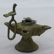 An archaistic bronze lamp