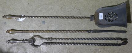 A set of three 19th century polished steel fire irons