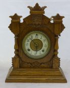 An oak mantle clock