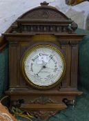 A walnut framed barometer