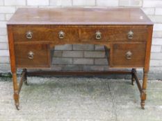 An early 20th century oak desk