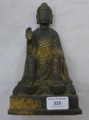 A painted bronze Buddha