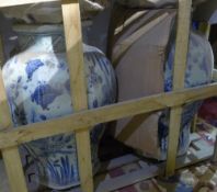 A pair of octagonal blue and white vases