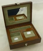 A square leather jewellery box