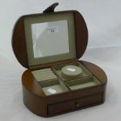 An oval leather jewellery box