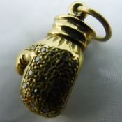 A 9 ct gold boxing glove pendant