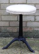 A cast metal stool