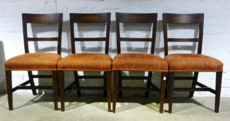 A set of four Victorian inlaid mahogany dining chairs