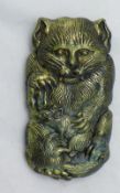 A novelty brass vesta in the form of a cat