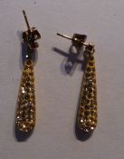 A pair of 9 ct gold earrings
