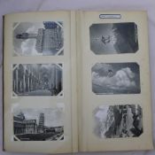 A postcard album containing postcards