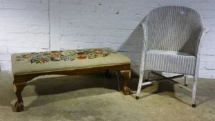 A stool and a Lloyd Loom chair