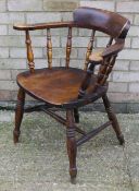 A Victorian smokers bow armchair