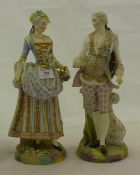 A pair of Continental bisque porcelain figures