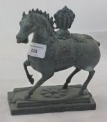 A bronze figure of a horse