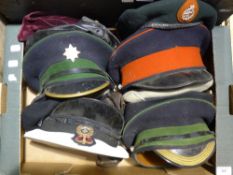 A quantity of military hats