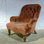 A Victorian upholstered armchair