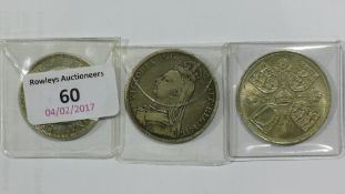 Three crown size coins