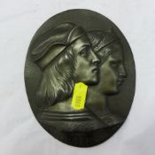 A bronzed figural plaque