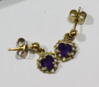 A pair of 9 ct gold and amethyst earrings
