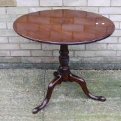 A George III mahogany tilt top tripod table