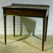 A 19th century brass mounted writing table