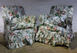 A pair of early 20th century upholstered armchairs