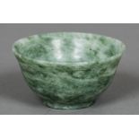 A small Chinese jade bowl Of simple flared form. 10 cm diameter.
