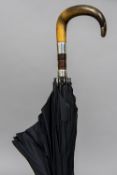 A George V silver mounted horn handled umbrella, hallmarked London 1912, maker's mark of JS & S 89.