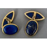 A pair of unmarked 18 ct gold lapis set cufflinks One side oval, the other of navette form.