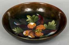 A William Moorcroft pottery bowl Decorated with the Hibiscus pattern,