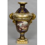 An early 19th century Crown Derby twin handled vase Decorated with a view of Lincoln,