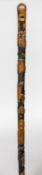 An early 19th century carved walking stick Carved with a bust of Wellington and inscribed