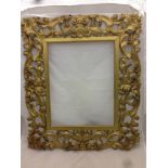 A 19th century carved giltwood framed wall glass The framed probably Venetian,