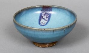 A Chinese Jun bowl Typically glazed. 17 cm diameter.