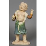 A Chinese pottery model of a Han dynasty boxer Modelled standing in open robe with fists clenched.