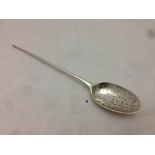 A Georgian silver moat spoon The pierced bowl with plain stem and pointed finial. 18.5 cm long.