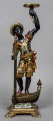 A late 19th/early 20th century Venetian painted carved wooden Blackamoor Modelled as a gondolier