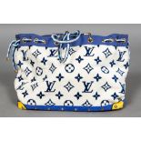 A large Louis Vuitton monogrammed towelling beach bag With plaited rope handles. 54 cm wide.