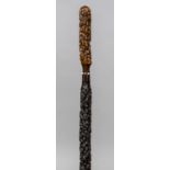 A 19th century walking stick Carved to resemble an umbrella. 87.5 cm long.