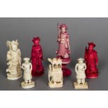 Seven various 19th century ivory and stained ivory chess pieces The largest 11.5 cm high.