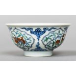 A Chinese porcelain tea bowl,