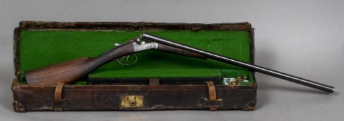 A 19th century English double barrel 12 bore box lock shotgun by E Whitehouse & Son,