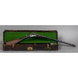 A 19th century English double barrel 12 bore box lock shotgun by E Whitehouse & Son,