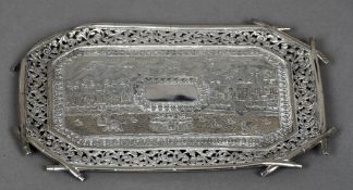 A 19th century unmarked Indian silver stand Centred with a river and townscape panel depicting