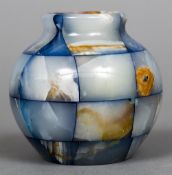 An unusual alabaster vase Of squat bulbous segmented form. 9.5 cm high.