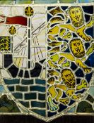 A stained glass panel Worked with possibly the King's Lynn Town coat-of-arms, framed.