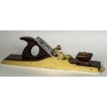 A 21 1/2 inch brass panel plane With Hernshaw Bros. iron. 54.5 cm long.