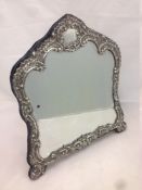 An Edwardian silver mounted dressing table mirror, hallmarked Birmingham 1903,